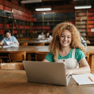 One young woman working on the laptop