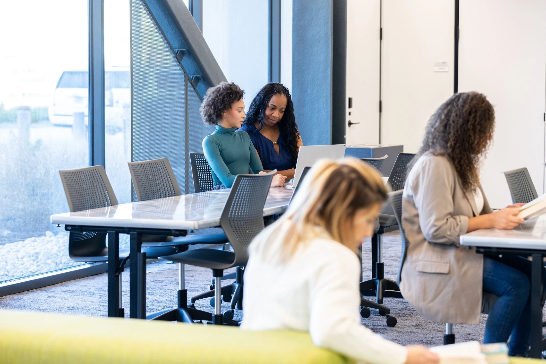 People studying together in a welcoming shared learning space